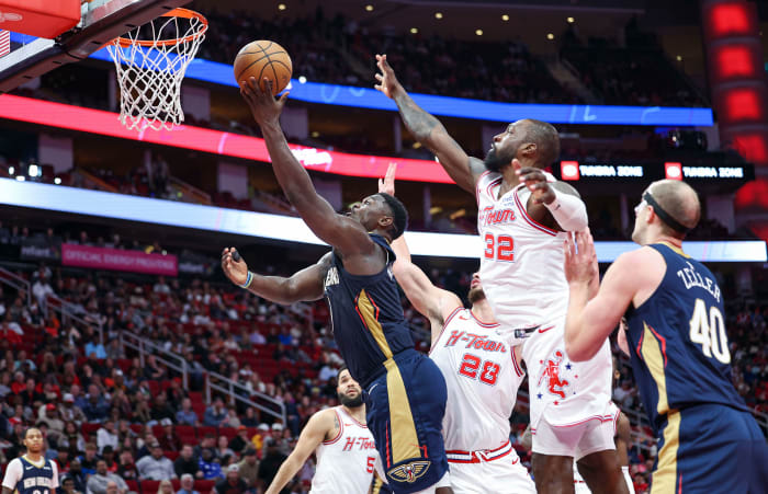 Pelicans forward Zion Williamson scores a basket during the second quarter against the Houston Rockets at Toyota Center.